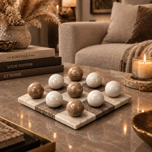 Set of marble balls on a checkered stone surface
