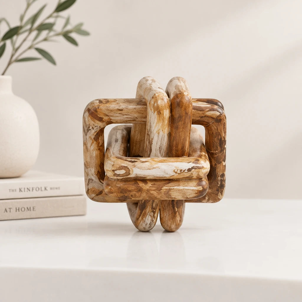 A rustic wooden knot puzzle with a weathered, natural brown finish, isolated on a white background.