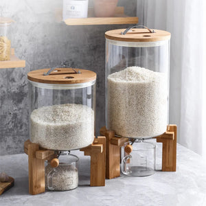 Set of glass containers with wooden lids and stands on a neutral background