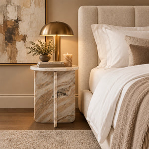 Round marble side table with a beige and brown pattern on a white background