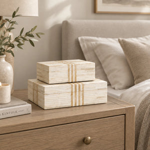 Two wooden boxes with striped pattern on a white background
