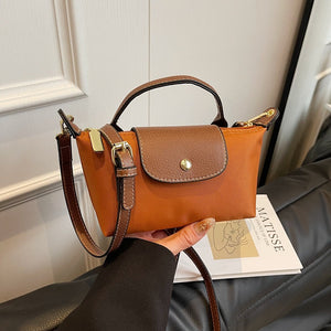 Mini Nylon Dumpling Crossbody Bag – F