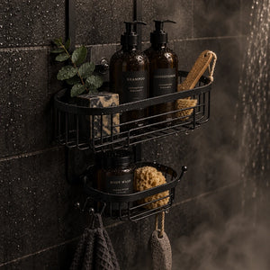 Black metal shower caddy with hooks on a white background