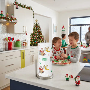 A roll of paper towels with a festive Christmas pattern featuring Santa Claus, reindeer, snowflakes, and the text 'Merry Christmas' on a white background.