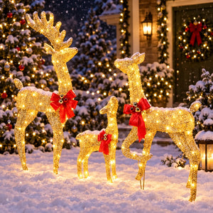 Decorative gold deer with red bows on a white background