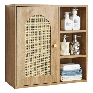 Wooden cabinet with wicker door and shelves containing bathroom products on a white background